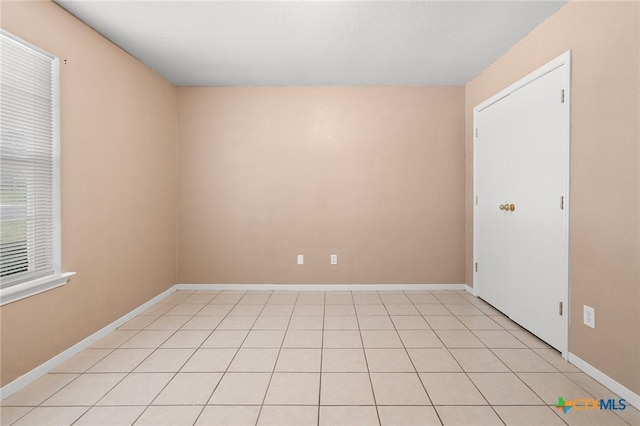 1413 Hopi Trl, Harker Heights, TX 76548 - unfurnished room featuring baseboards and light tile patterned flooring