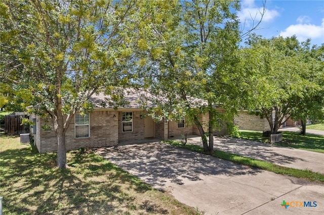 1413 Hopi Trl, Harker Heights, TX 76548 - obstructed view of property with driveway and brick siding