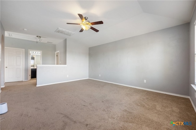 unfurnished living room featuring light carpet, ceiling fan, and vaulted ceiling