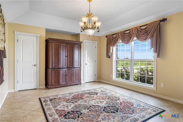444 E Maxwell Ditch Rd, Port Lavaca, TX 77979 - foyer featuring light tile patterned floors and a chandelier