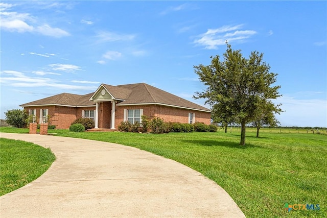 444 E Maxwell Ditch Rd, Port Lavaca, TX 77979 - single story home with a front yard and brick siding