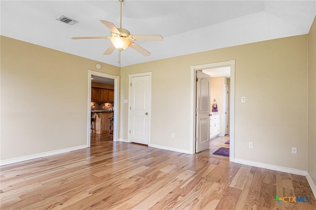 444 E Maxwell Ditch Rd, Port Lavaca, TX 77979 - unfurnished bedroom with light wood-style flooring and ceiling fan