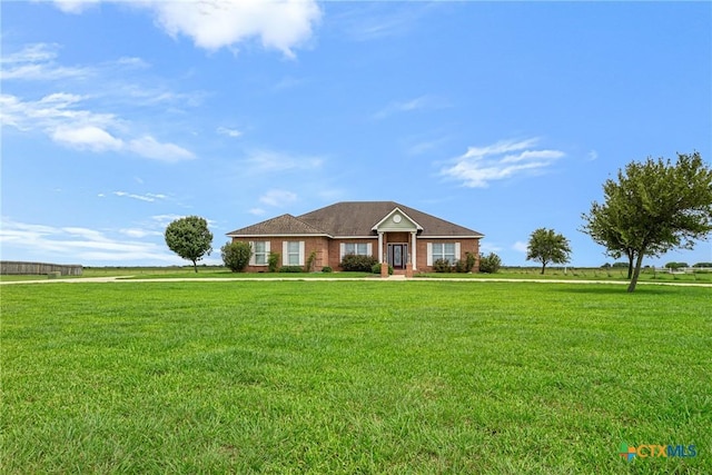 444 E Maxwell Ditch Rd, Port Lavaca, TX 77979 - ranch-style house with a front yard and brick siding