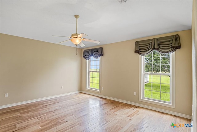 444 E Maxwell Ditch Rd, Port Lavaca, TX 77979 - spare room with light wood finished floors and a ceiling fan