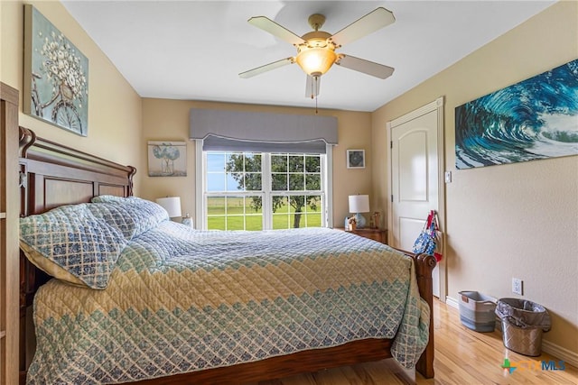 444 E Maxwell Ditch Rd, Port Lavaca, TX 77979 - bedroom featuring wood finished floors and ceiling fan