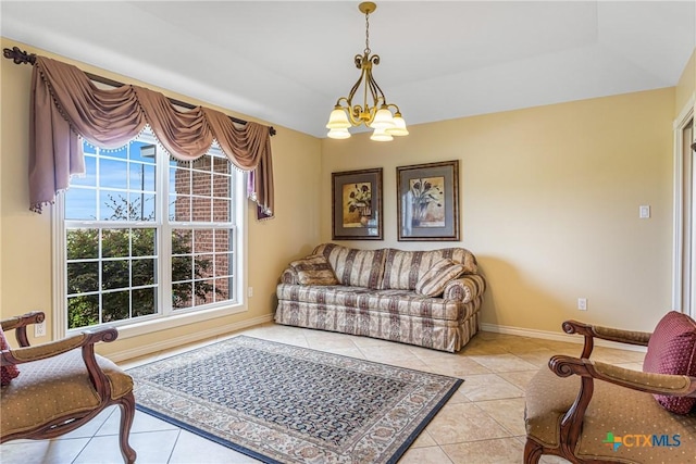 444 E Maxwell Ditch Rd, Port Lavaca, TX 77979 - living room with a chandelier and light tile patterned floors