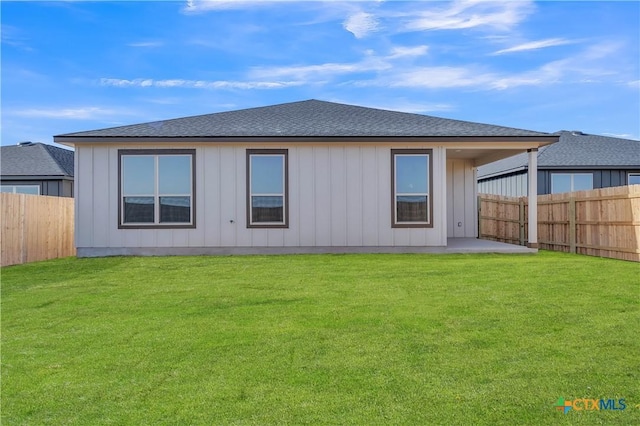 2318 Healy Dr, Temple, TX 76502 - rear view of property featuring board and batten siding and a shingled roof