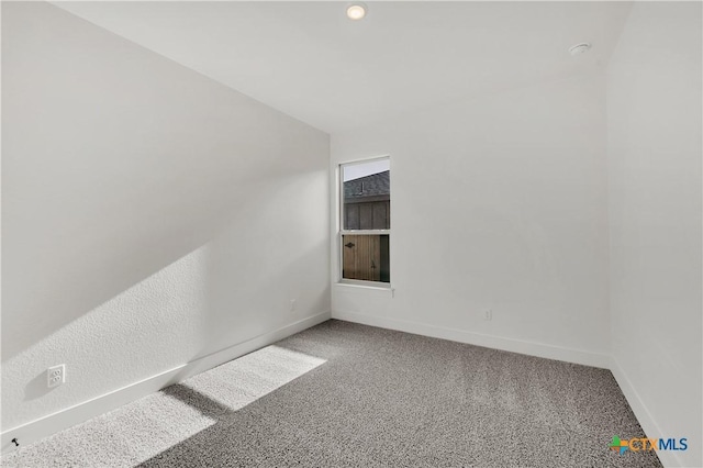2318 Healy Dr, Temple, TX 76502 - spare room featuring carpet and baseboards