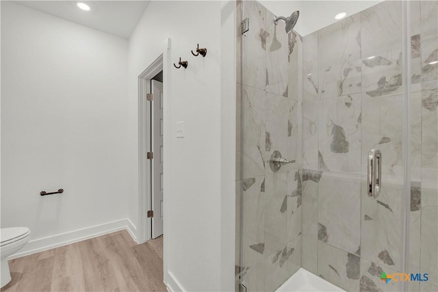 2318 Healy Dr, Temple, TX 76502 - full bathroom with toilet, a marble finish shower, wood finished floors, baseboards, and recessed lighting