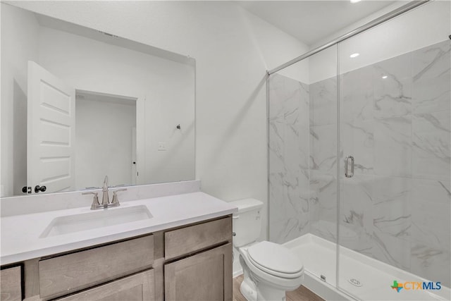 2318 Healy Dr, Temple, TX 76502 - full bath featuring a marble finish shower, vanity, and toilet