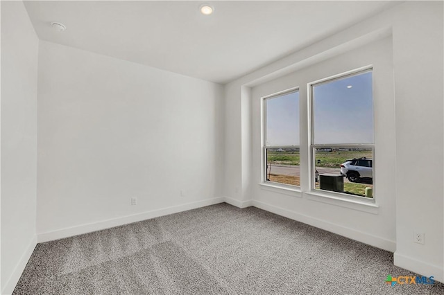 2318 Healy Dr, Temple, TX 76502 - empty room featuring carpet flooring, baseboards, and recessed lighting