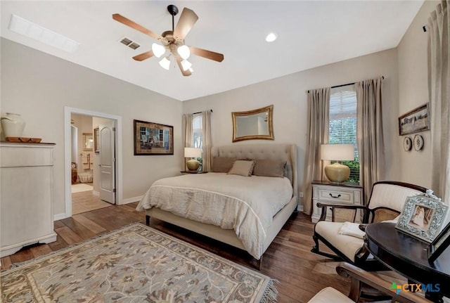 10510 Teich Loop, New Braunfels, TX 78132 - bedroom featuring visible vents, baseboards, wood finished floors, and multiple windows