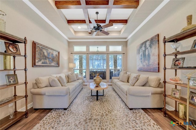 10510 Teich Loop, New Braunfels, TX 78132 - living room featuring a ceiling fan, beam ceiling, wood finished floors, baseboards, and coffered ceiling