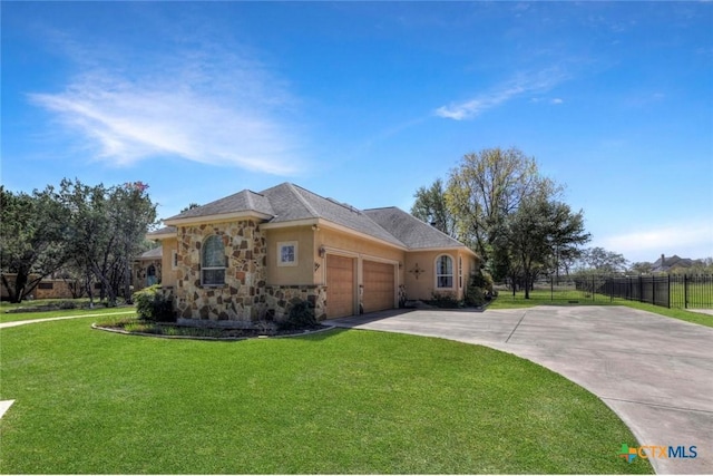 10510 Teich Loop, New Braunfels, TX 78132 - ranch-style home with fence, stone siding, a garage, a front yard, and concrete driveway