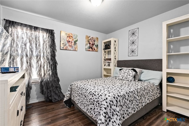 4505 Prewitt Ranch Rd, Killeen, TX 76549 - bedroom with dark wood finished floors and baseboards