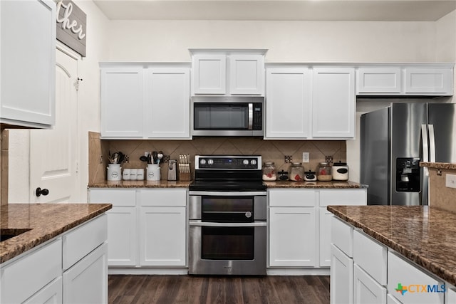 4505 Prewitt Ranch Rd, Killeen, TX 76549 - kitchen with stainless steel appliances, white cabinetry, dark stone countertops, and tasteful backsplash