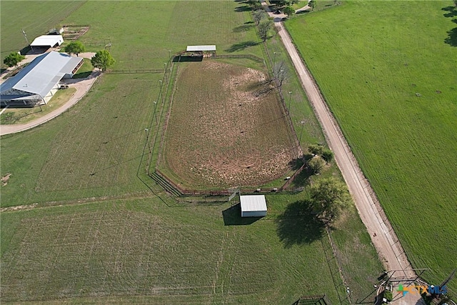 birds eye view of property featuring a rural view