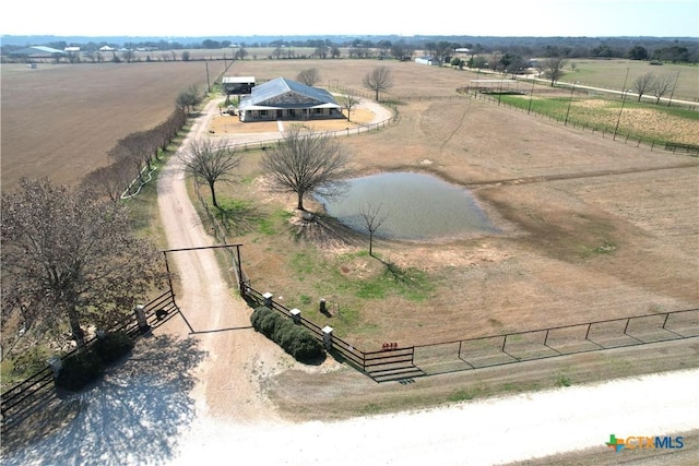 birds eye view of property featuring a rural view