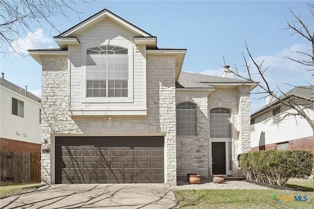 view of front of home with a garage, roof with shingles, driveway, and fence