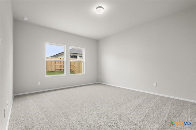 124 Linnet Ln, Maxwell, TX 78656 - empty room with carpet floors and a smoke detector