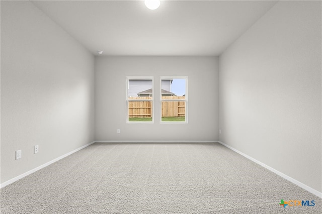 124 Linnet Ln, Maxwell, TX 78656 - empty room with carpet floors and baseboards