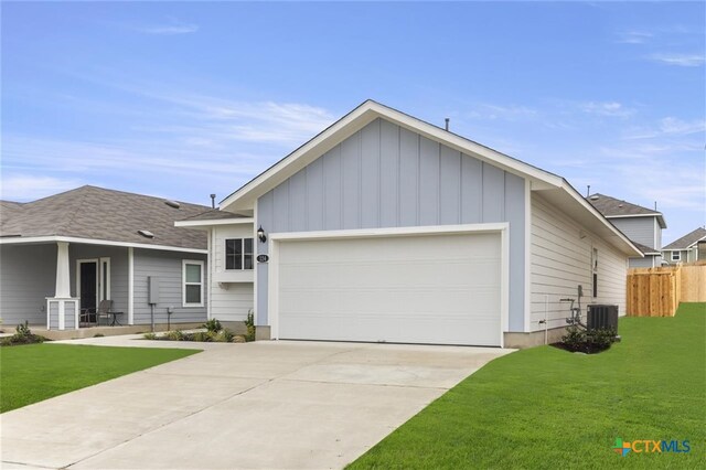 124 Linnet Ln, Maxwell, TX 78656 - view of front facade with a garage, concrete driveway, and board and batten siding