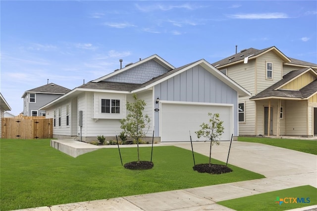 craftsman-style house with a front yard and a garage