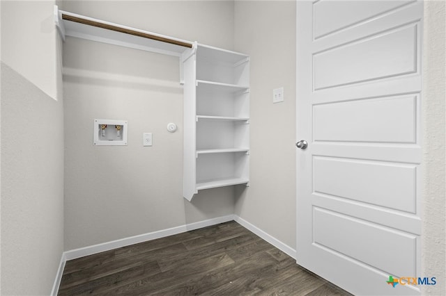 laundry room featuring washer hookup and dark wood-type flooring