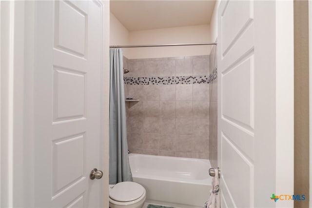 29121 Ismorada, San Antonio, TX 78260 - bathroom with toilet and shower / bath combo with shower curtain