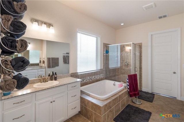 29121 Ismorada, San Antonio, TX 78260 - full bath featuring a shower stall, a garden tub, vanity, and tile patterned floors