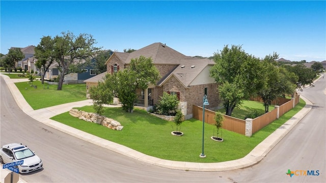 29121 Ismorada, San Antonio, TX 78260 - view of front of home with a residential view and brick siding