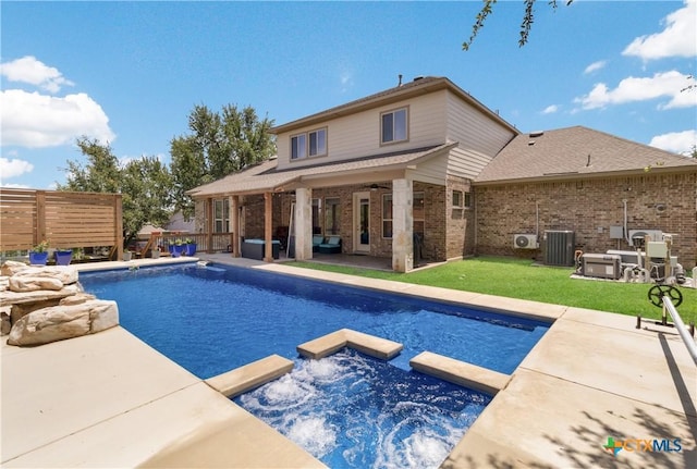 29121 Ismorada, San Antonio, TX 78260 - view of swimming pool featuring an in-ground hot tub, central AC, ceiling fan, and a patio