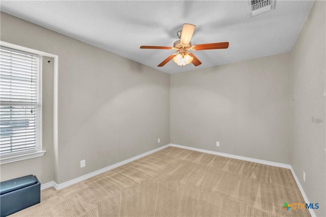 2506 Alamocitos Creek Dr, Killeen, TX 76549 - spare room featuring ceiling fan, carpet flooring, and baseboards