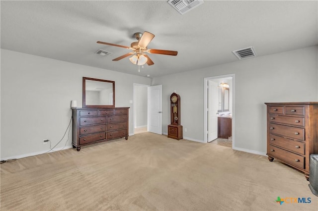 2506 Alamocitos Creek Dr, Killeen, TX 76549 - bedroom featuring light carpet, baseboards, a ceiling fan, and ensuite bathroom