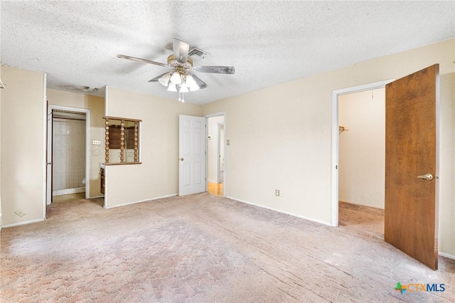 14311 Arrowood, San Antonio, TX 78233 - unfurnished bedroom with a textured ceiling, carpet, and ceiling fan
