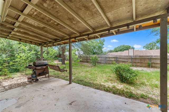 14311 Arrowood, San Antonio, TX 78233 - fenced backyard featuring a patio and a grill