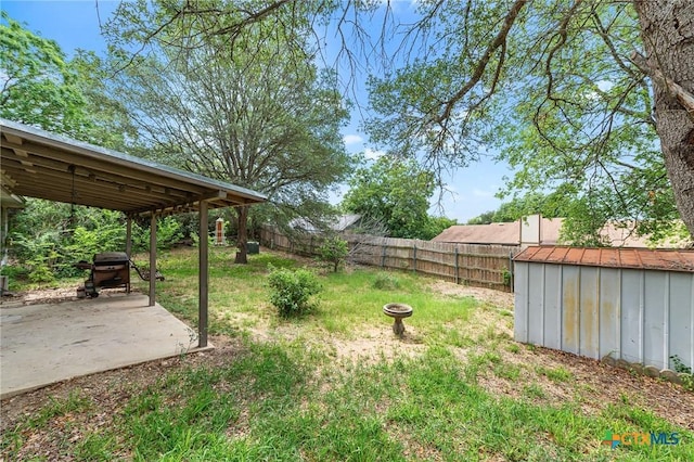 14311 Arrowood, San Antonio, TX 78233 - fenced backyard featuring a patio