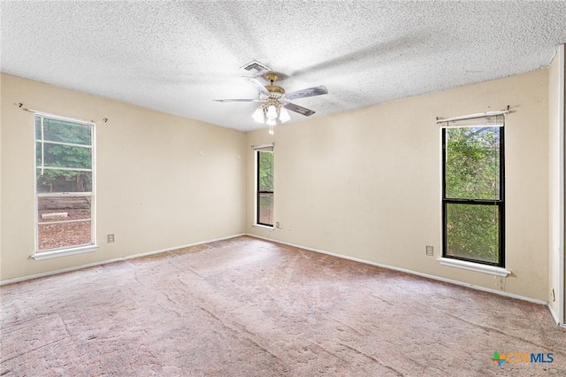 14311 Arrowood, San Antonio, TX 78233 - empty room with a ceiling fan, carpet flooring, and a textured ceiling
