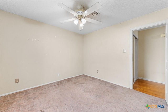 14311 Arrowood, San Antonio, TX 78233 - unfurnished room featuring carpet flooring, ceiling fan, and a textured ceiling