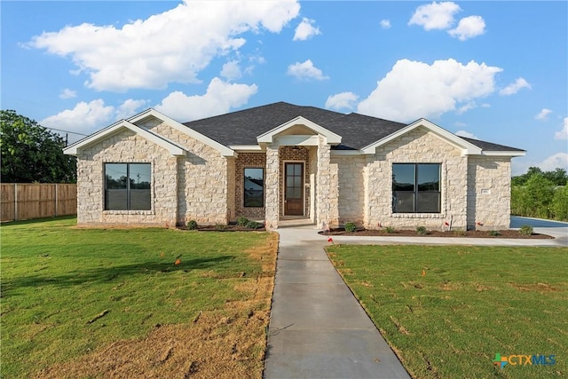 101 Dana Point Rd, Lorena, TX 76655 - view of front of home with stone siding and a shingled roof