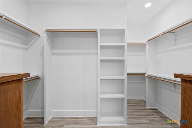101 Dana Point Rd, Lorena, TX 76655 - walk in closet with wood finished floors