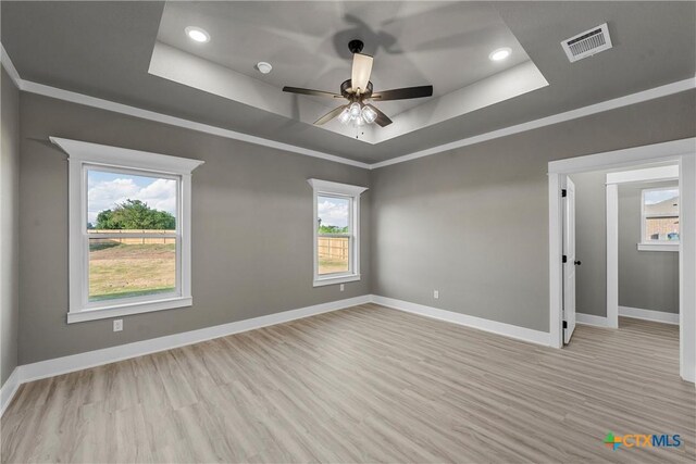 101 Dana Point Rd, Lorena, TX 76655 - empty room with a raised ceiling, light wood finished floors, baseboards, a ceiling fan, and recessed lighting