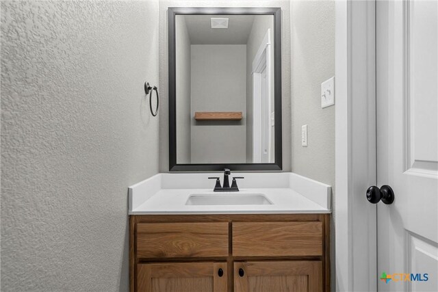 101 Dana Point Rd, Lorena, TX 76655 - bathroom with a textured wall and vanity