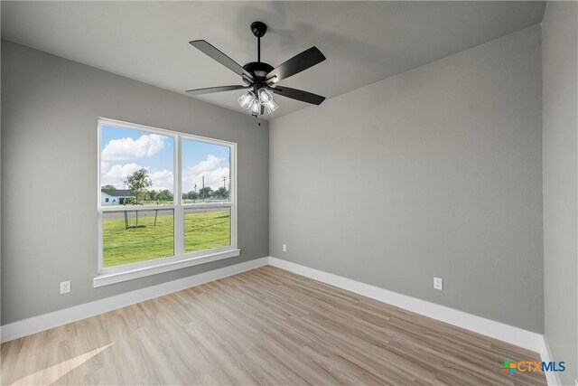 101 Dana Point Rd, Lorena, TX 76655 - empty room featuring wood finished floors, baseboards, and ceiling fan
