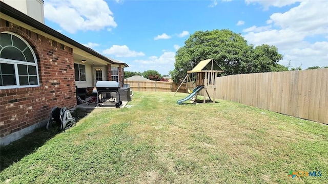 501 Mesquite Cir, Copperas Cove, TX 76522 - fenced backyard with a playground