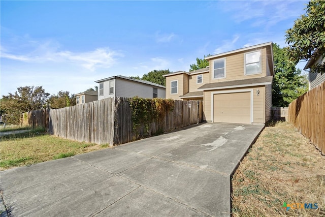 view of front of property with a garage