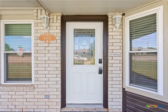 4409 Beach Ball Dr, Killeen, TX 76549 - view of exterior entry with brick siding and a porch