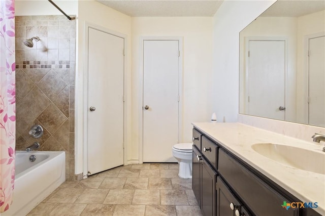 4409 Beach Ball Dr, Killeen, TX 76549 - full bath with toilet, vanity, shower / tub combo with curtain, and stone finish flooring
