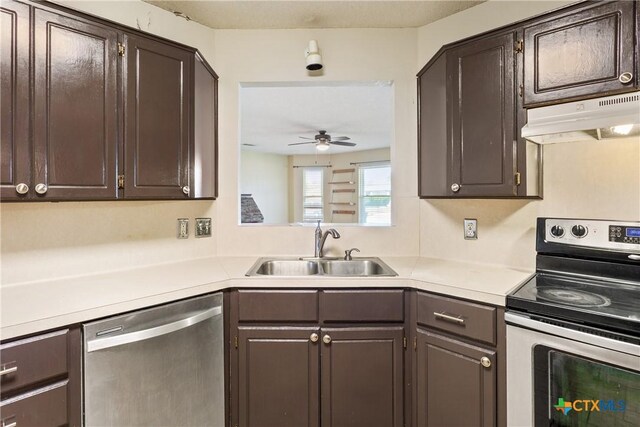 4409 Beach Ball Dr, Killeen, TX 76549 - kitchen featuring appliances with stainless steel finishes, under cabinet range hood, a sink, ceiling fan, and light countertops