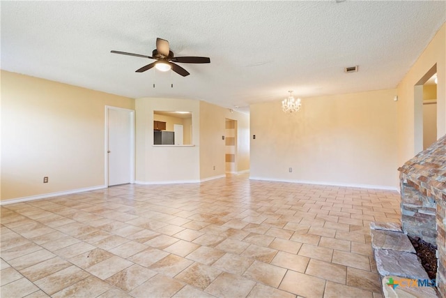 4409 Beach Ball Dr, Killeen, TX 76549 - unfurnished living room featuring ceiling fan, a chandelier, a textured ceiling, and baseboards